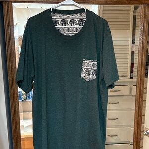 On the Byas Green pocket Tee with elephant print design XL